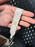 決色Udemos手機掛繩時(shí)尚通用掛鏈素皮短鏈便攜飾品防丟皮革手帶手鏈 云紗白 曬單實(shí)拍圖