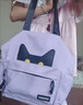 暢印百搭帆布包男女款小貓雙肩包大容量書(shū)包可單肩手提補習學(xué)生斜挎包 紫色 曬單實(shí)拍圖