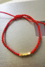 菜百首飾 黃金手鏈 古法碎金子編織繩手鏈情侶紅色 計價(jià) 約0.75克 曬單實(shí)拍圖