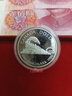 1986年加拿大發(fā)行溫哥華建城1加元精制紀念銀幣（微瑕） 曬單實(shí)拍圖