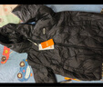 雪中飛【壓膠工藝】?jī)和鸾q服新款男女童秋冬季輕薄保暖外套 黑色 150 曬單實(shí)拍圖
