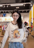 妖精的口袋慵懶風(fēng)印花長(cháng)袖t恤女2025年夏新款寬松休閑設計感上衣 迷彩米杏色 L 曬單實(shí)拍圖