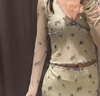 UR2025秋季新款女裝蝴蝶結V領(lǐng)碎花木耳邊長(cháng)袖T恤UYL450054 米白 （領(lǐng)口偏低） S 曬單實(shí)拍圖