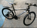 金武端自行車(chē)成人山地車(chē)公路賽車(chē)單車(chē)騎行變速超輕越野中學(xué)生初中青少年 頂配版-輻條輪-黑白色 26寸21速 曬單實(shí)拍圖