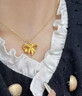 中國黃金（CHINA GOLD）蝴蝶結黃金吊墜女款在逃公主項鏈足金鎖骨鏈情人節(jié)生日禮物送女友 【今/次日達】蝴蝶結吊墜【配S925鏈】約0.7g 曬單實拍圖