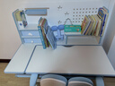 憶瞳兒童學(xué)習書(shū)桌椅套裝多功能可升降中小學(xué)生桌椅子寫(xiě)字家用課桌 星辰1.0-1米實(shí)木桌+追背椅藍 曬單實(shí)拍圖