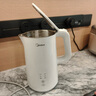 美的（Midea）電熱水壺家用電水壺?zé)畨?雙層防燙 0涂層食品級304不銹鋼 1500W快速沸騰 1.7L大容量 HJ1705 曬單實拍圖