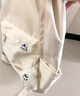 JINSHIWQ書(shū)包女初中生高中生雙肩包男大學(xué)生背包  黃色帶掛件 曬單實(shí)拍圖