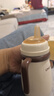 千禧寶貝嬰幼兒保溫杯兒童奶瓶奶嘴1-3歲學(xué)飲杯6個(gè)月以上寶寶水杯水壺外出 保溫奶瓶【加奶嘴+鴨嘴+重力球】送杯套 300ml 曬單實(shí)拍圖