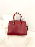 ANYSMIC奢侈品牌包包女包2025新款大容量手提包女真皮斜挎包氣質(zhì)媽媽包 棗紅色 曬單實(shí)拍圖