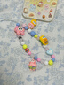 繁夏海綿寶寶串珠手機鏈包包掛件裝飾ccd掛飾相機鏈防丟鑰匙扣掛鏈女 曬單實(shí)拍圖