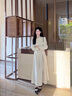 舒芳蝶（shufangdie）長(zhǎng)袖斜門襟連衣裙女裝2025秋季新款設(shè)計(jì)感今年流行漂亮收腰裙子潮 杏色 M 曬單實(shí)拍圖