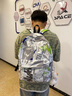 回力大學(xué)生雙肩包男新款休閑涂鴉潮流初高中生大容量書(shū)包女個(gè)性背包 曬單實(shí)拍圖