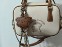 卓詩(shī)尼潦草小狗聯(lián)名包包2025新款手提包女時(shí)尚復古單肩斜挎包 米白色 曬單實(shí)拍圖