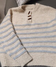 復古牛角扣毛衣女秋冬2025秋季新款設計感撞色條紋圓領(lǐng)毛衣女上衣 米白色 M 適合100-115斤 曬單實(shí)拍圖