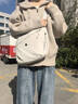 回力慵懶風(fēng)帆布包包女2025新款斜挎包大容量餃子包休閑通勤旅行托特包 米白色【三防面料/可放11.5英寸平板】 單包 曬單實(shí)拍圖