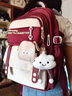普思圖（PUSITU）書(shū)包女初中生輕便減負高中生超大容量雙肩包小學(xué)生4-6年級背包 紅色【送掛件+零錢(qián)包】 曬單實(shí)拍圖