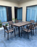 皇聚德戶(hù)外庭院桌椅 室外露天防雨防曬別墅花園休閑塑木桌椅組合 咖啡色 巴克6椅+160x90cm拼花長(cháng)桌 鐵 曬單實(shí)拍圖