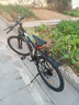 夢(mèng)幻鳥(niǎo)鳳凰晟象男女通用成人學(xué)生變速減震通勤戶(hù)外公路車(chē)自行車(chē)山地車(chē) 暗夜黑 21速 24英寸 曬單實(shí)拍圖