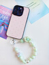 繁夏韓版小清新手機掛鏈編織花朵鑰匙扣防丟手腕掛繩包包掛飾珠鏈女 曬單實(shí)拍圖
