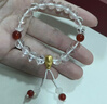 中國黃金（CHINA GOLD）黃財神鴻運招財時(shí)尚手鏈女白水晶足金手串紀念日生日禮物送女朋友 重量約2.9g-3.3g【活動(dòng)定制款不支持7天無(wú)理由退換貨】 曬單實(shí)拍圖