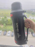 恩爾美（nRMEi）保溫杯壺大容量戶(hù)外72小時(shí)長(cháng)效保溫瓶男家用熱水瓶車(chē)載便攜旅行壺 磐石黑2000ml【72小時(shí)保溫+提手+背帶】 曬單實(shí)拍圖