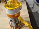 膳魔師（THERMOS）兒童水杯316l不銹鋼保溫杯寶寶水杯小學(xué)生吸管杯耐磨防摔可斜跨 黃恐龍 320ml（帶恐龍蛋+杯繩） 曬單實(shí)拍圖