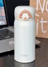 膳魔師（THERMOS）不銹鋼保溫杯大容量男女士?jì)和銛y水杯生日禮物團購定制JNR 奶油白【熱賣(mài)推薦】 350ml 曬單實(shí)拍圖