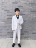 勤度男童主持人禮服西裝兒童套裝韓版小西服帥氣春秋男孩鋼琴演出服裝 白色(西裝+褲子+馬甲+黑襯衫)+領(lǐng) 120 cm建議體重40-48斤 曬單實(shí)拍圖