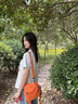 ANYSMIC奢侈品牌女雙肩包2025新款百搭旅游迷你可斜挎單肩貝殼日系小背包 橙色 曬單實(shí)拍圖