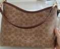 蔻馳（COACH）【官方授權店】奢侈品女包Laurel31流浪包手提單肩斜挎送女友禮物 CV975SVPWH 曬單實(shí)拍圖