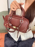 紐芝蘭（NUCELLE）【沈月同款】糖果保齡球包包2025女式真皮波士頓包通勤單肩斜挎包 絳紅色+星月禮盒 曬單實(shí)拍圖