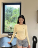 唐獅（TonLion）2025秋女圓領(lǐng)左胸圖案長袖T恤 曬單實拍圖