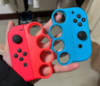 探咖switch網(wǎng)球拍sports健身環(huán)NS游戲手柄體感運動(dòng)套裝羽毛球馬里奧joycon有氧拳擊3握把拳套手環(huán)配件 Switch有氧拳擊握把-藍紅1對裝 曬單實(shí)拍圖