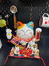 吉貓堂招財貓擺件開(kāi)業(yè)大號自動(dòng)搖手店鋪前臺家居客廳裝飾發(fā)財貓送禮禮品 32CM高【我為財運舉大旗】當次日達 【禮盒+坐墊+圍脖】電池插電兩用 曬單實(shí)拍圖
