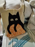 京東物流 手拎針織包可愛(ài)卡通貓咪包復古高級撞色手腕包上班包 慵懶貓咪針織包（米色） 曬單實(shí)拍圖