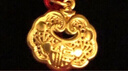 中國黃金（CHINA GOLD）長(cháng)命鎖黃金項鏈男女寶寶足金平安鎖吊墜嬰兒童送滿(mǎn)月周歲生日禮物 平安鎖項鏈【黑繩-兒童】約0.5g 曬單實(shí)拍圖