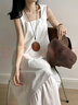 鉑吶苓連衣裙女2025夏高級感小眾設計法式初戀無(wú)袖白色背心氣質(zhì)寬松長(cháng)裙 不規則吊帶連衣裙【白色】 L 100-115斤 曬單實(shí)拍圖