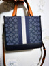 蔻馳（COACH）奧萊女士女包經(jīng)典條紋貼飾DEMPSEY 22號手提托特包 IM/丹寧藍色/榛子色 曬單實(shí)拍圖