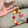 京川旭手機鏈掛繩手腕款網(wǎng)紅多巴胺蘋(píng)果核ins彩色掛飾手工可愛(ài)串珠手機鏈ccd掛繩相機便攜掛件吊墜手鏈 可愛(ài)蘋(píng)果核手機掛飾-不帶夾片 曬單實(shí)拍圖