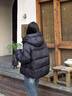 蕓蕁羽絨服女2025新款泡芙龜背短款冬季白鴨絨連帽加厚面包服外套 黑色 S (85-120斤) 曬單實(shí)拍圖