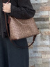 蔻馳（COACH）奧萊女士女包經(jīng)典標志LAUREL流浪包單肩包斜挎通勤麻將包 IM/棕黃色/棕色 曬單實(shí)拍圖