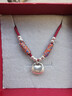 銀坨坨實(shí)心999足銀平安鎖小胖福袋紅繩純銀項鏈編繩情侶吊墜女生 女款酒紅色 銀坨坨吊墜 曬單實(shí)拍圖