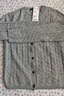優(yōu)衣庫女裝紐花圓領(lǐng)針織開(kāi)衫/毛衣外套空調衫通勤秋冬新款481477 03 灰色 M 曬單實(shí)拍圖