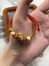 中國黃金（CHINA GOLD）平安喜樂(lè )馬年寶寶黃金手鏈足金馬上有錢(qián)紅手繩新生嬰兒滿(mǎn)月周歲禮 足金錢(qián)幣飛馬平安喜樂(lè )紅繩 曬單實(shí)拍圖