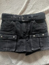 MO&Co.牛仔裙褲酷辣低腰工裝口袋A字短褲搖滾洗磨附腰帶摩安珂 牛仔黑色 S 26 曬單實(shí)拍圖