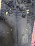 UR2025秋季新款女裝潮流涂鴉破洞磨破彎刀牛仔長(cháng)褲UYV850150 曬單實(shí)拍圖
