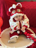 優(yōu)奇嬰兒拜年服冬裝連體衣寶寶新年衣服冬季新生幼兒冬天保暖喜慶棉服 紅色喜慶拜年服+帽子 80cm 曬單實(shí)拍圖