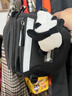 回力（Warrior）潮牌港風(fēng)胸包男工裝潮流街拍休閑斜挎包騎行運動(dòng)腰包女 黑色款【帶白熊貓掛件】 曬單實(shí)拍圖