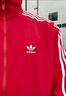 三葉草（Adidas）男女 經(jīng)典休閑風(fēng)衣運動(dòng)連帽外套 夾克 CW1310 M 曬單實(shí)拍圖